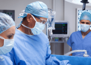 How Safe Are Surgery Centers? &Raquo; Photo Of Doctors And Nurses Working On A Patient In An Operating Room Canva 1 E1680557173757 300X215 1