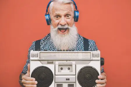 Engaging Entertainment Choices For The Baby Boomer Generation &Raquo; Happy Senior Man Listening To Music With Boombox A 2022 01 28 11 01 11 Utc