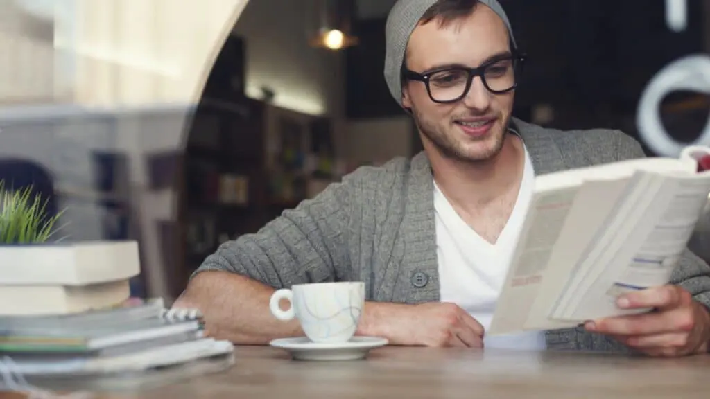 16 Ways The Rich Make Even More Money By Working Less 46 Hipster Man Reading Book