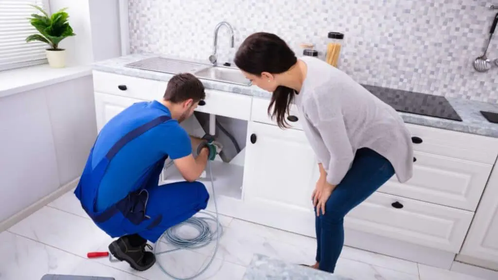 15 Lucrative Jobs Making Over $100K Without A College Degree 12 Plumber