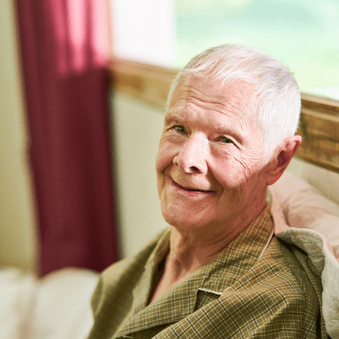 bedridden patient receiving care for caregiver