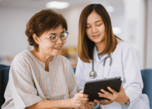 Why Are Second Opinions Important? &Raquo; Photo Of An Asian Woman Talking With A Young Female Doctor While Seated On A Sofa Together New Canva E1674686232800 300X215 1