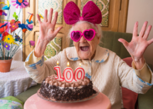 Discrimination And Disparities In Healthcare &Raquo; Photo Of A Woman Celebrating Turning 100 Years Old Bigger Canva E1675183858130 300X215 1