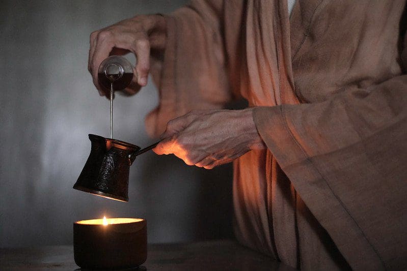 Woman Pouring Oil For Self Massage