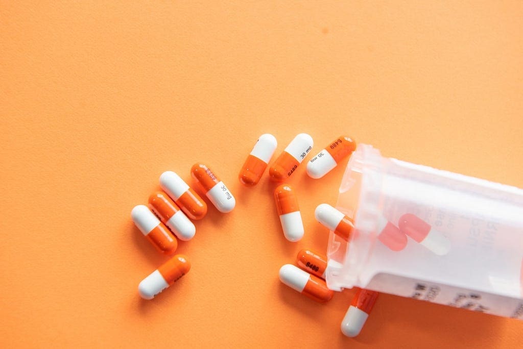 A Bunch Of Medicine Pills On The Table