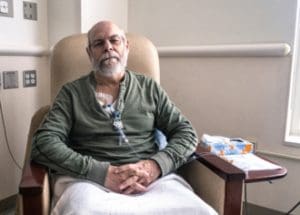 Can You Trust At-Home Cancer Tests? &Raquo; Photo Of Older Man Sitting In A Hospital Chair Receiving Chemo Treatments Through A Port In His Chest Canva 1 E1687784917825 300X215 1