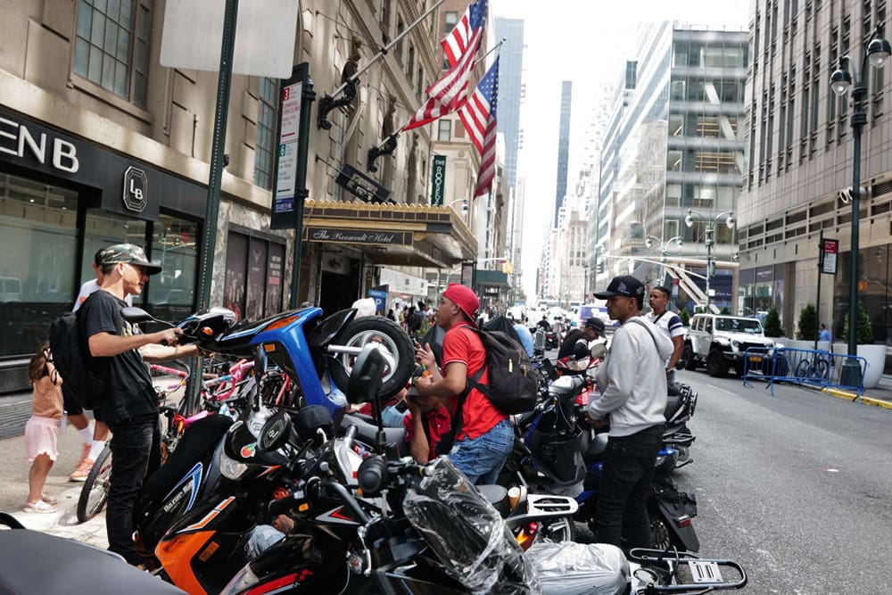 Nypd Confiscated Up To 80 Unlicensed Mopeds Outside Hotel Shelters &Raquo; Recently Arrived Migrants Gather Outside