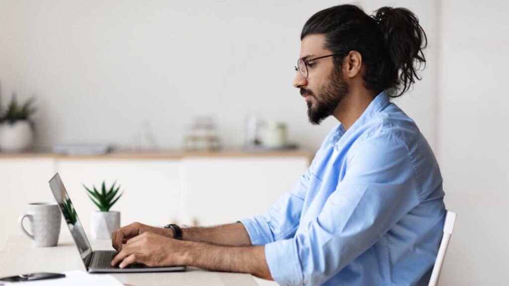 Man Working In Laptop