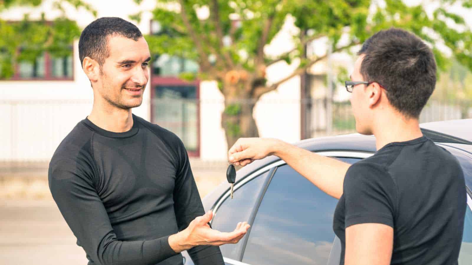 Men Buying Second Hand Car