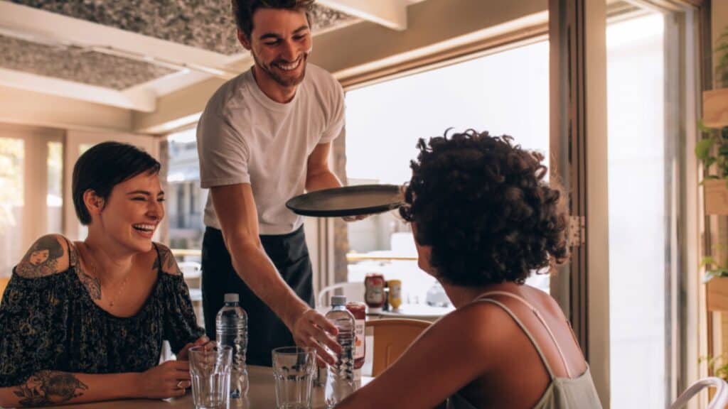 Waiter Serving Water