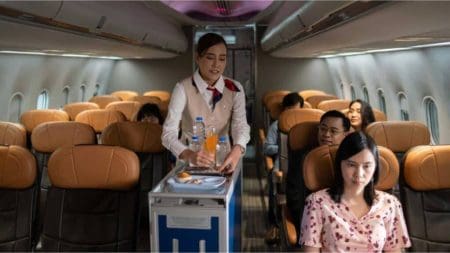 10 Best Responses To The Question: Is It Really This Cheap To Travel? &Raquo; Woman Traveling In Flight 1024X576 1