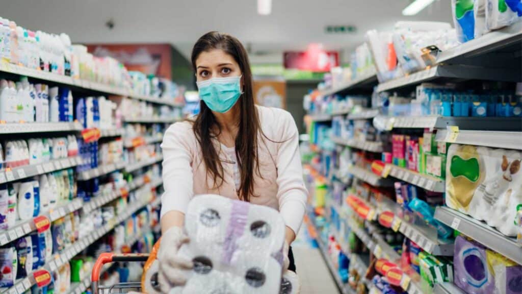 Woman Buying Paper Towels