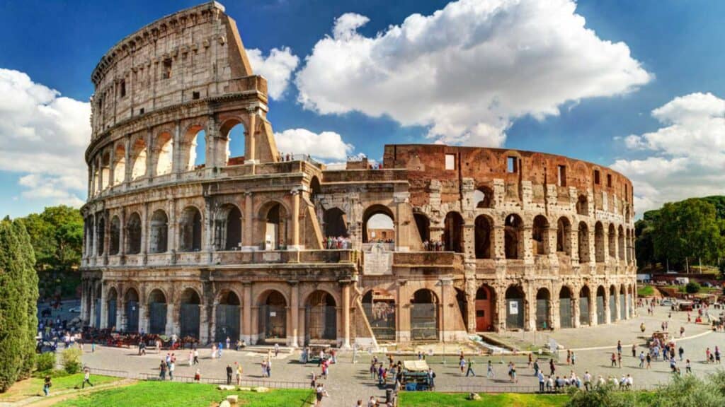 Colosseum In Rome, Italy. Ancient Roman Colosseum Is One Of Main Tourist Attractions In Europe. People Visit Famous Colosseum In Roma City Center. Scenic Nice View, Photo Of Colosseum Ruins In Summer