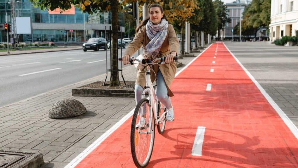 Woman Riding In Bike Lane