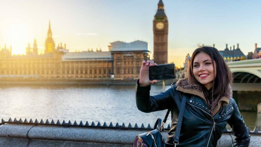 Woman Taking Photo In London