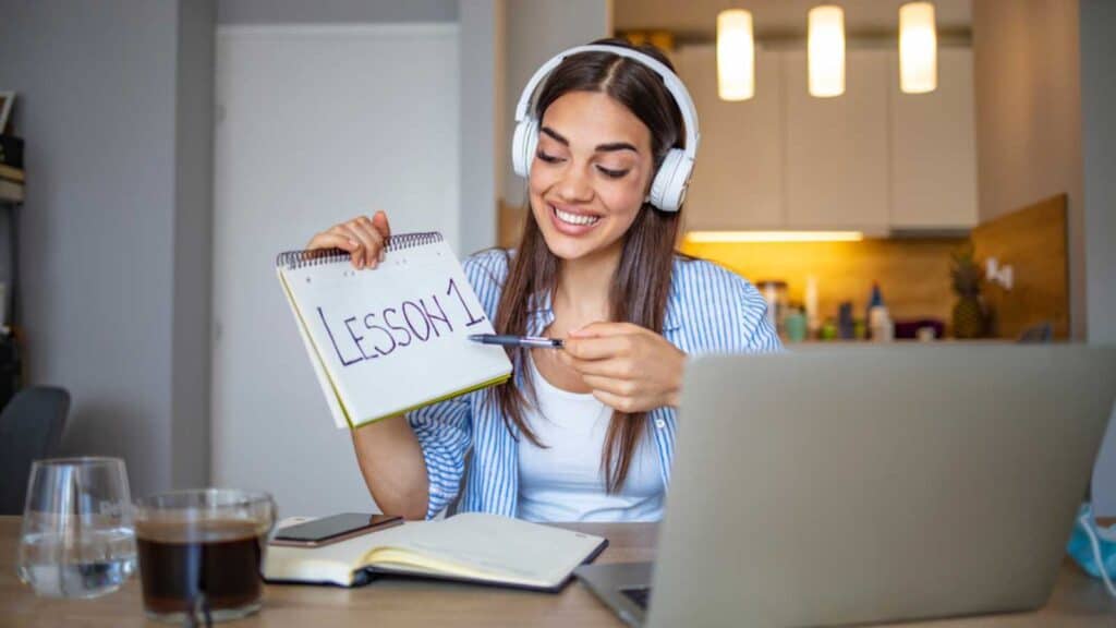 Cheerful Professor Communicate With Pupils Over Video Call.professor Holding Online Class For E-Learning School Kids And Students. Smart Professor At Home, Explaining Math To Students Over Video Call