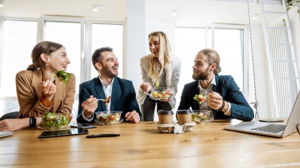 Group Of Young People Meeting For Lunch