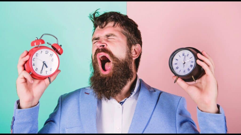 Unshaven Man Having Problem With Time Zone