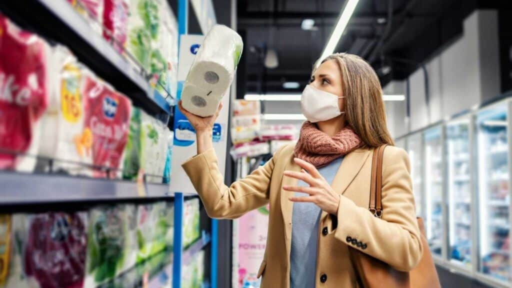 Woman Buying Toilet Paper