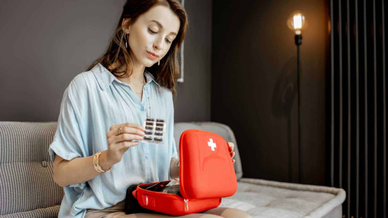 Woman With First Aid Box