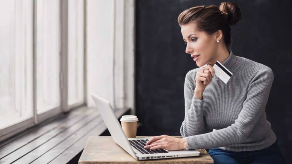 Young Woman Holding Credit Card