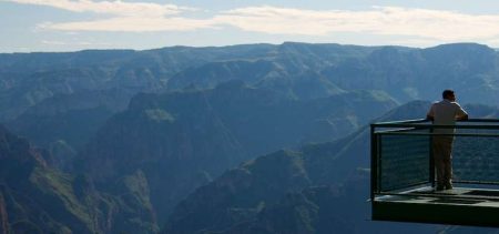 Embracing The Moment: The Power Of ‘Be Here Now’ In Mindful Travel &Raquo; Man On Bridge In Copper Canyon Divisadero Mexico Copyright 2011 Ralph Velasco