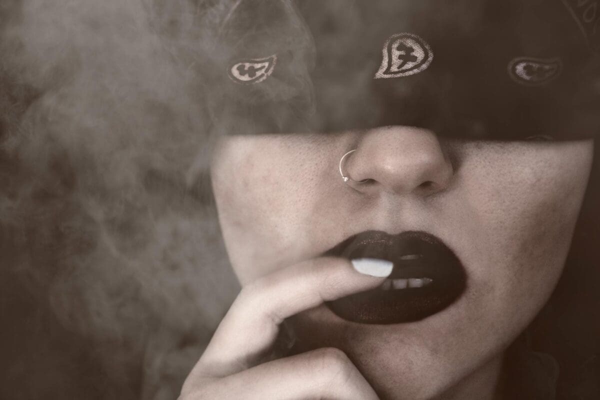 Blindfolded Woman With Finger On Lips Grayscale Portrait