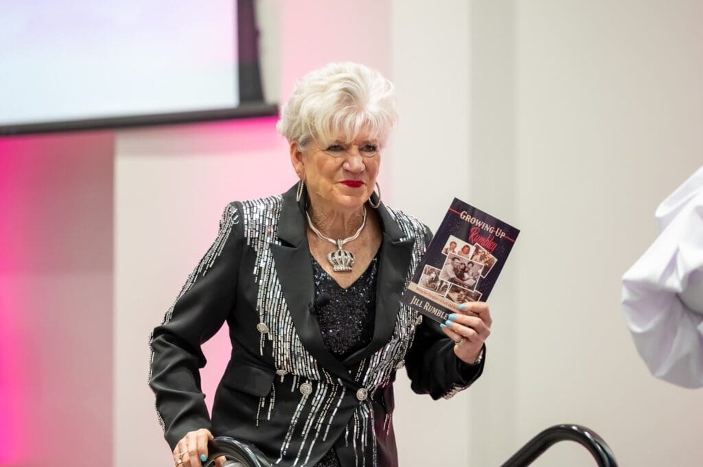 Photo Of Jill Rumbley Beam With Her Book, 