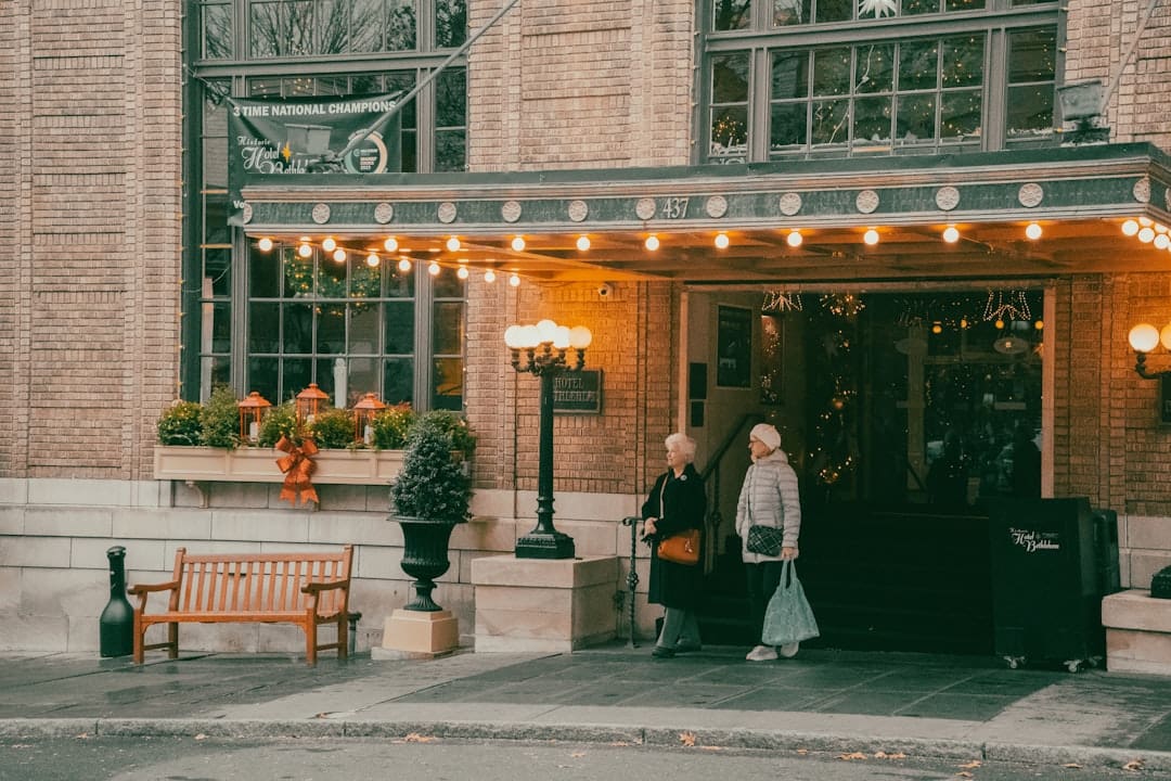 A Woman Is Standing Outside Of A Building